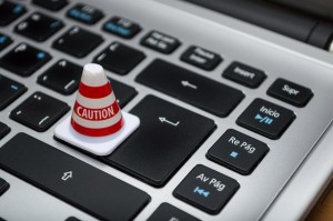 white-caution-cone-on-keyboard-211151